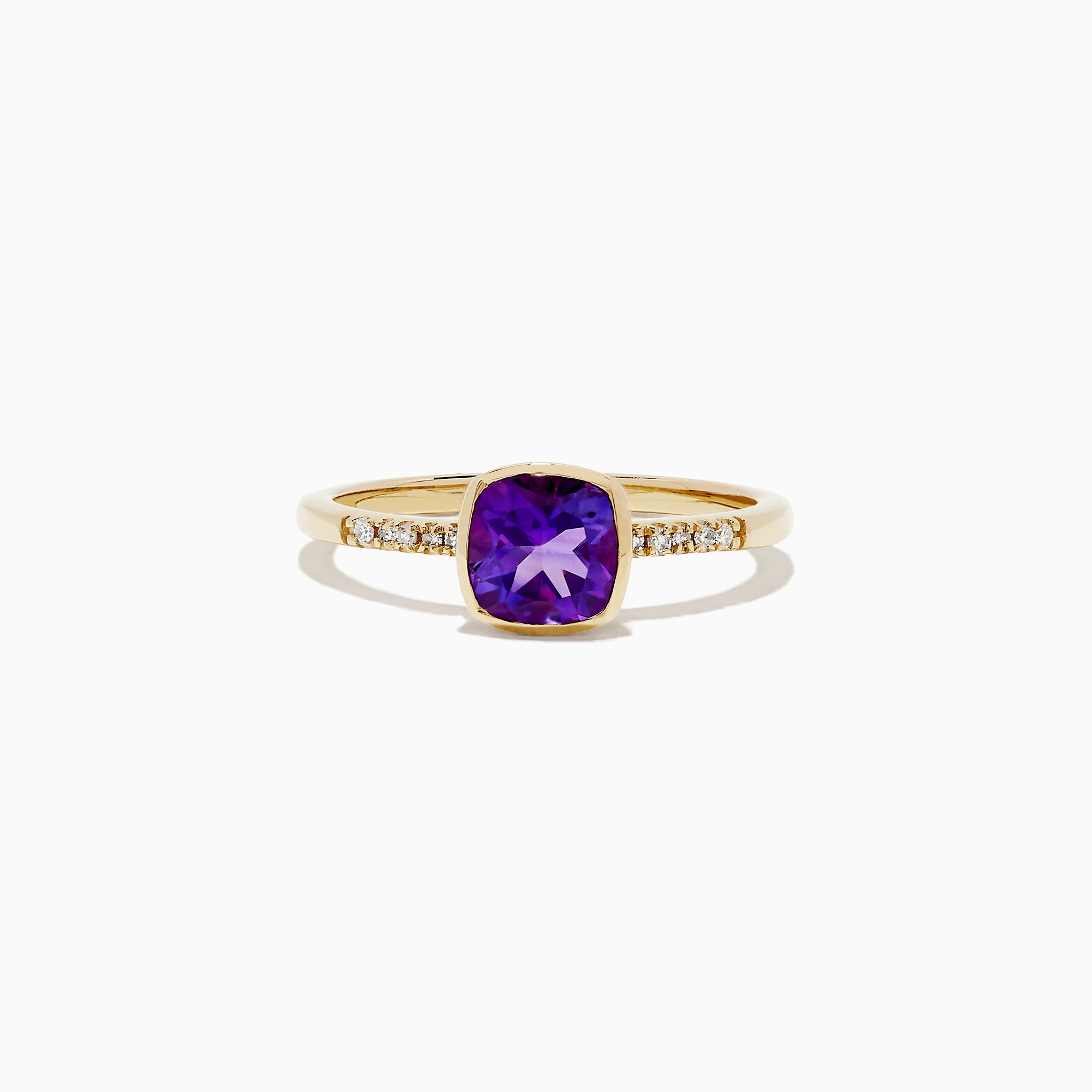 The 14K Yellow Gold Amethyst and Diamond Ring, 0.75 TCW features a cushion-cut amethyst center accented by round diamonds set into the band on each side.