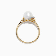 The 14K Yellow Gold Cultured Fresh Water Pearl and Diamond Ring features a striking freshwater pearl center accented by sparkling diamonds, with a total diamond carat weight of 0.04 TCW.