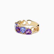 The 14K Yellow Gold Amethyst, Tanzanite and Diamond Ring features three large triangular amethyst and tanzanite stones with small round diamonds, shown on a white background.
