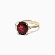The Bordeaux 14K Yellow Gold Garnet and Diamond Ring, 4.76 TCW, showcases a large oval deep red garnet center with sparkling diamonds along the band.