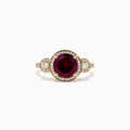 The Bordeaux 14K Yellow Gold Rhodolite Garnet and Diamond Ring (2.14 TCW) features a round rhodolite garnet center, haloed by white diamonds, with diamond accents along the band and two diamond clusters on each side.