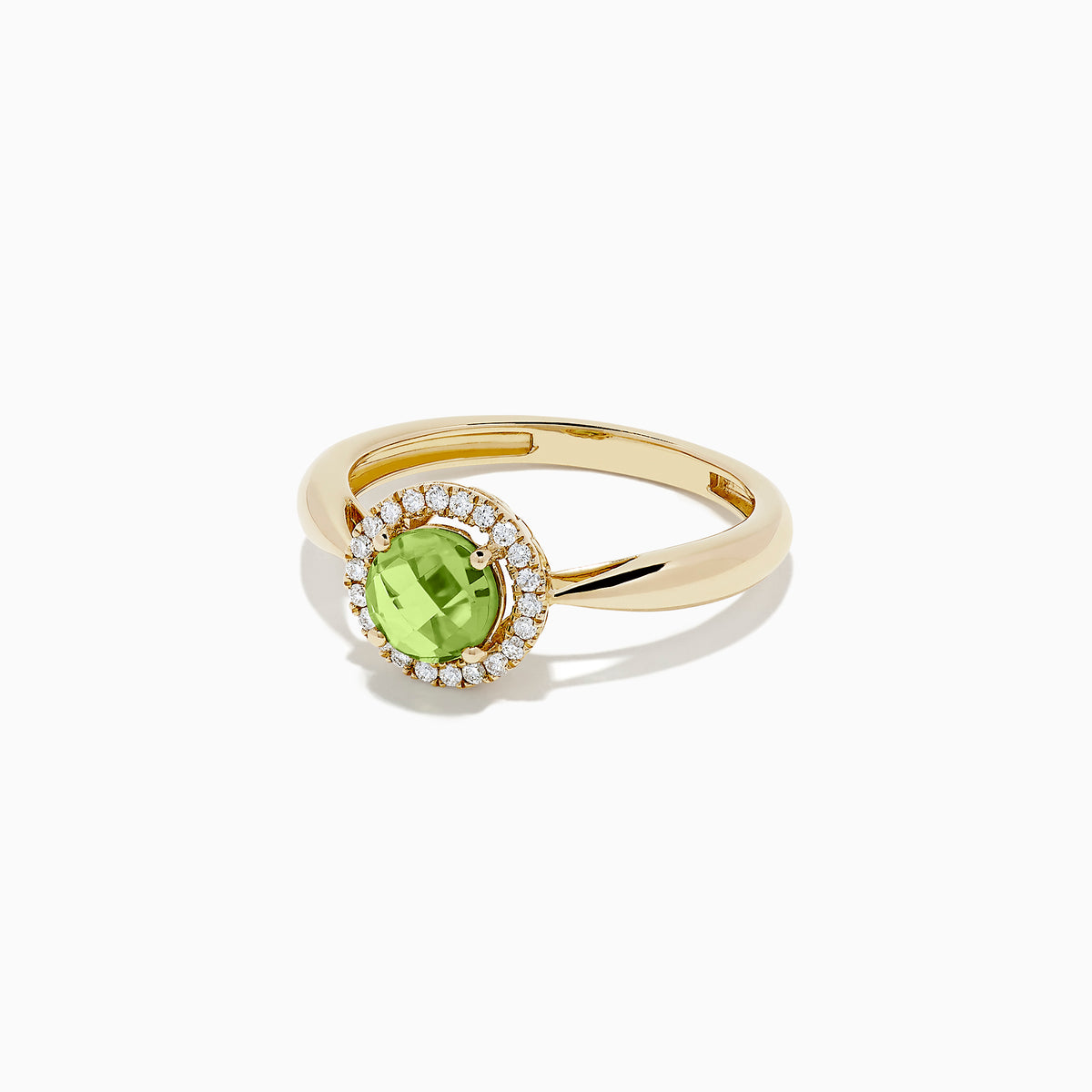 The 14k Yellow Gold Peridot and Diamond Ring, 1.10 TCW, showcases a round green peridot center encircled by a halo of sparkling diamonds, all set in yellow gold and displayed against a white background.