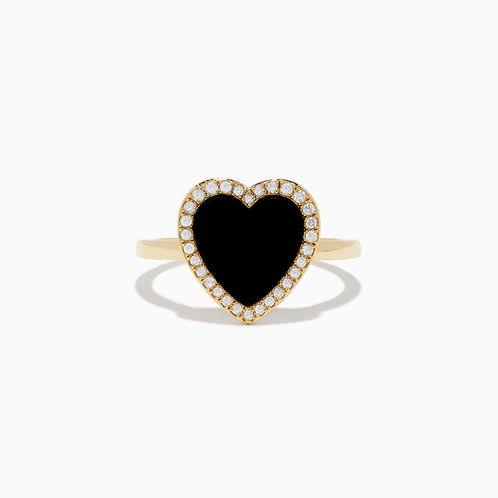 The 14K Yellow Gold Onyx and Diamond Heart Ring features a large heart-shaped onyx surrounded by sparkling diamonds, all set in yellow gold. Shown against a plain white background.