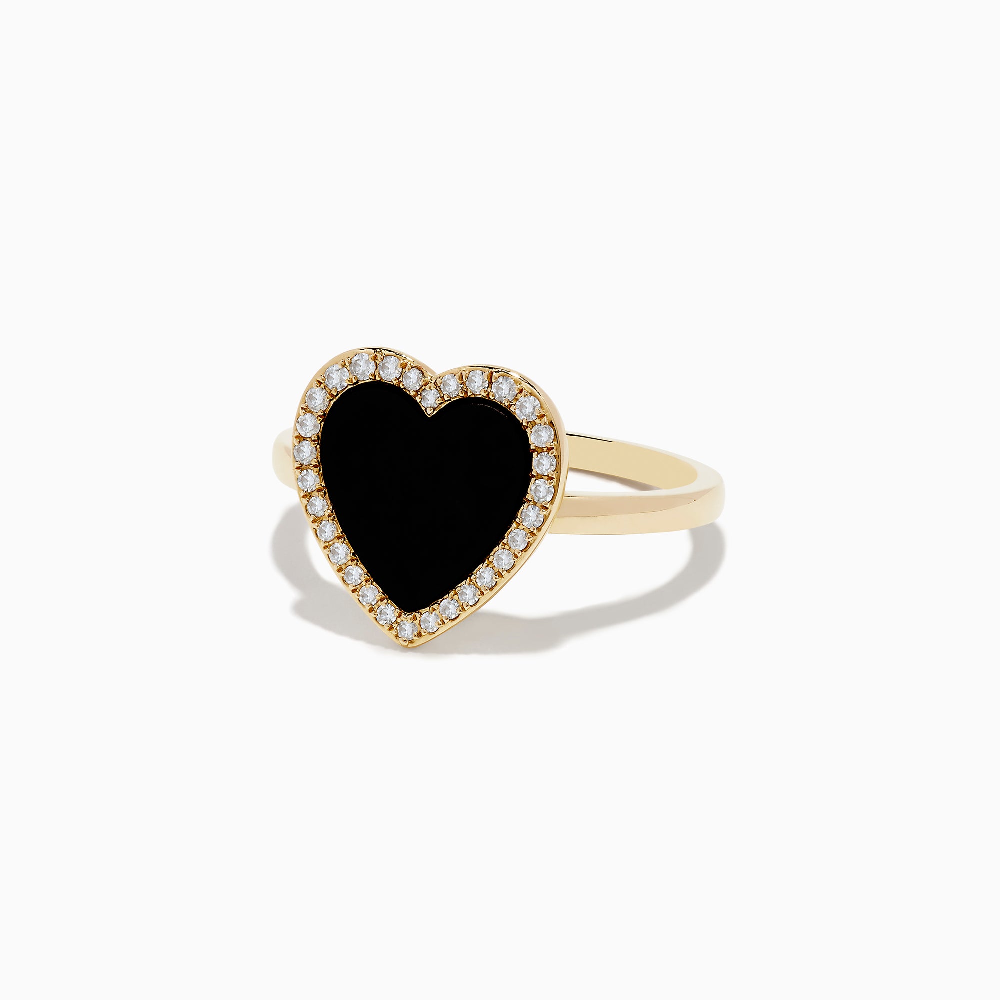 The 14K Yellow Gold Onyx and Diamond Heart Ring features a large heart-shaped onyx surrounded by sparkling diamonds, all set in yellow gold. Shown against a plain white background.