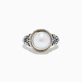 The 925 Sterling Silver and 18K Gold Fresh Water Pearl Ring features a large round freshwater pearl centerpiece, set in ornate sterling silver with a delicate 18K gold band accent.