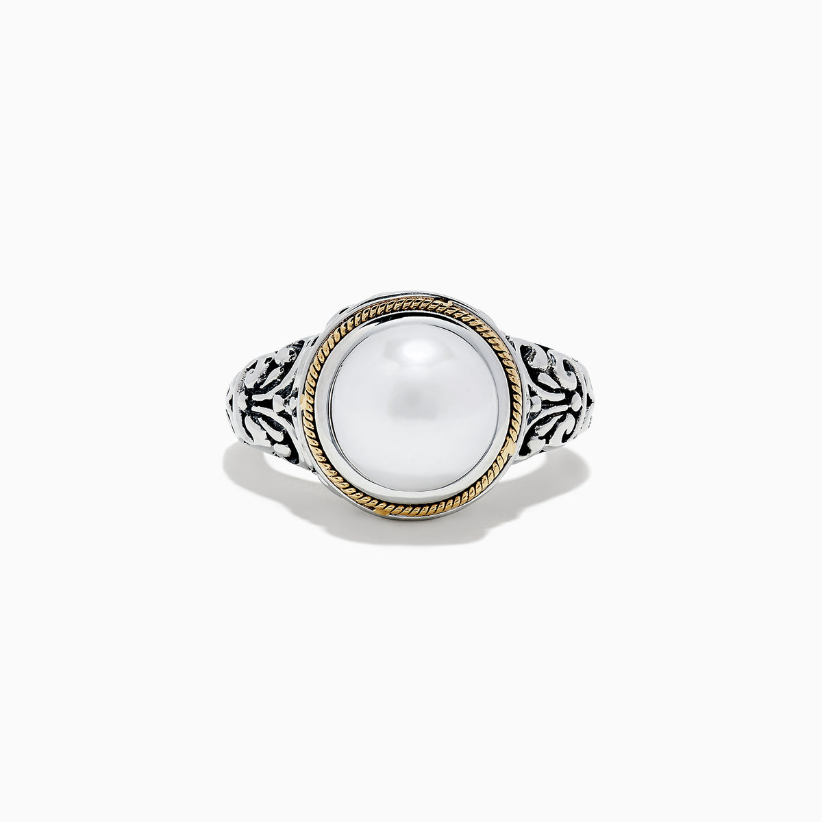 The 925 Sterling Silver and 18K Gold Fresh Water Pearl Ring features a large round freshwater pearl centerpiece, set in ornate sterling silver with a delicate 18K gold band accent.