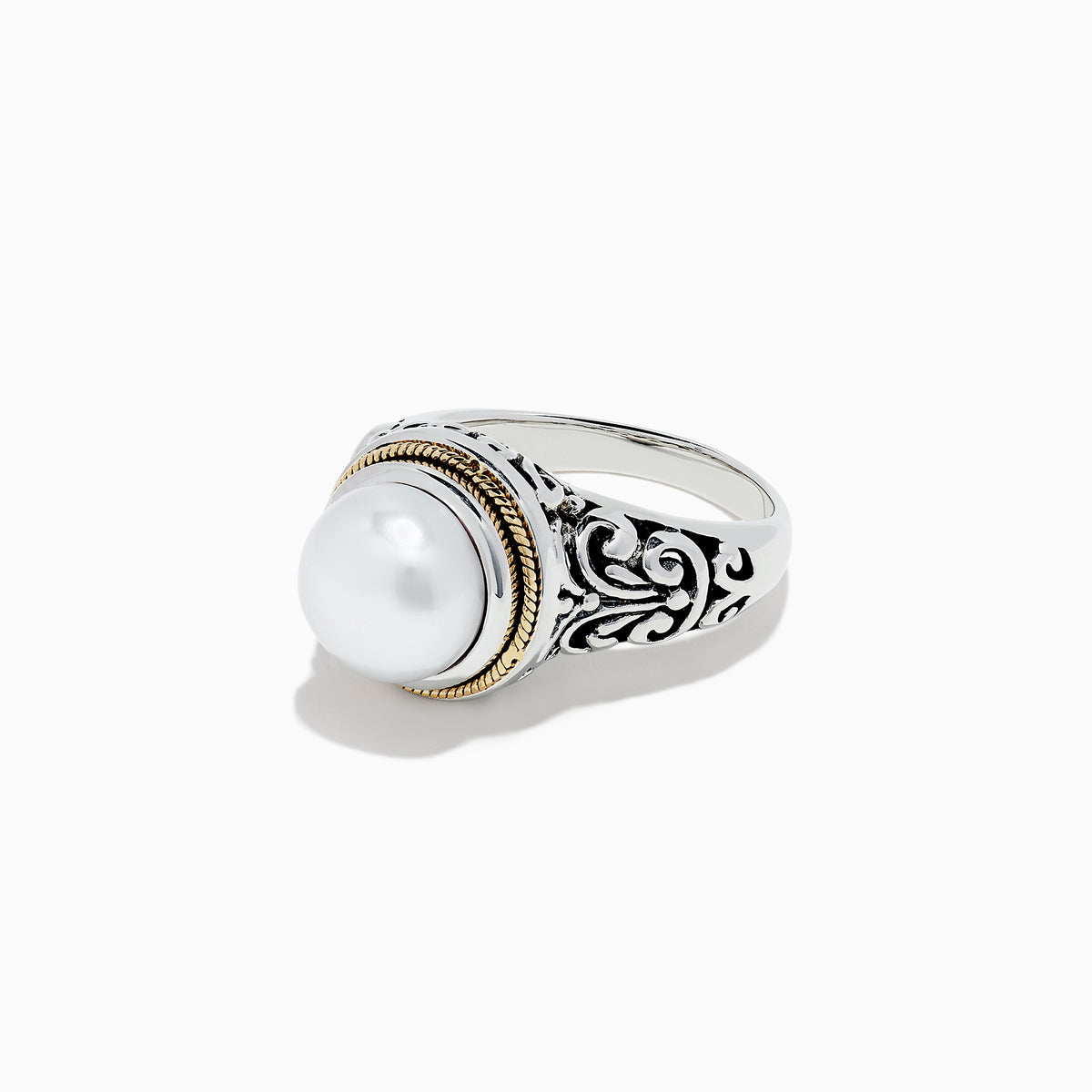 The 925 Sterling Silver and 18K Gold Fresh Water Pearl Ring features a large round freshwater pearl centerpiece, set in ornate sterling silver with a delicate 18K gold band accent.