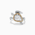 The Seaside Sterling Silver and 18K Gold Turtle Ring showcases a triangular shell-like centerpiece accented with gold beads, elegantly set against a plain white background.