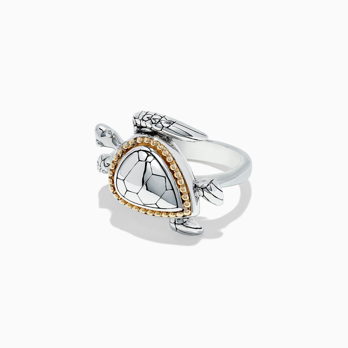 The Seaside Sterling Silver and 18K Gold Turtle Ring showcases a triangular shell-like centerpiece accented with gold beads, elegantly set against a plain white background.