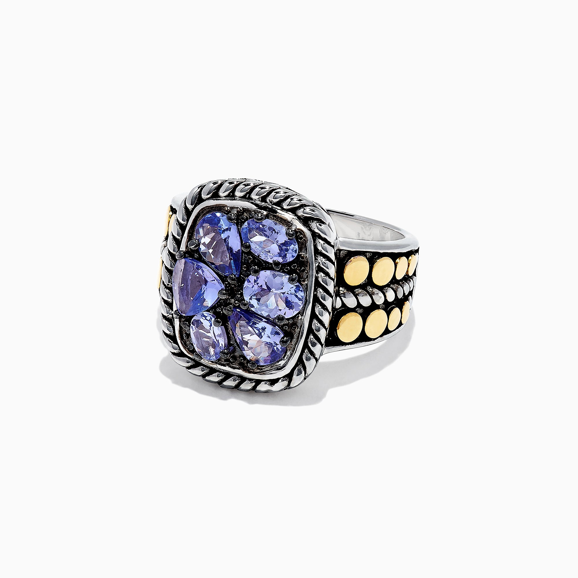 The Nahla Siri Silver & 18K Gold Tanzanite Ring, 1.85 TCW, features a twisted rope border, five purple tanzanites at the center, and gold dot accents along the band.