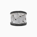 The 925 Sterling Silver Black Diamond Woven Ring, 1.23 TCW features a wide, textured woven design with two rows of black diamonds bordering the top and bottom edges.