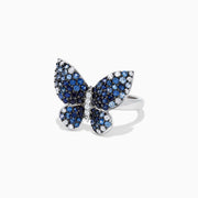 The Nature Sterling Silver Blue Sapphire Splash Butterfly Ring, 1.70 TCW, features blue sapphires and white gemstones artfully set to highlight the wings and body of the butterfly design.