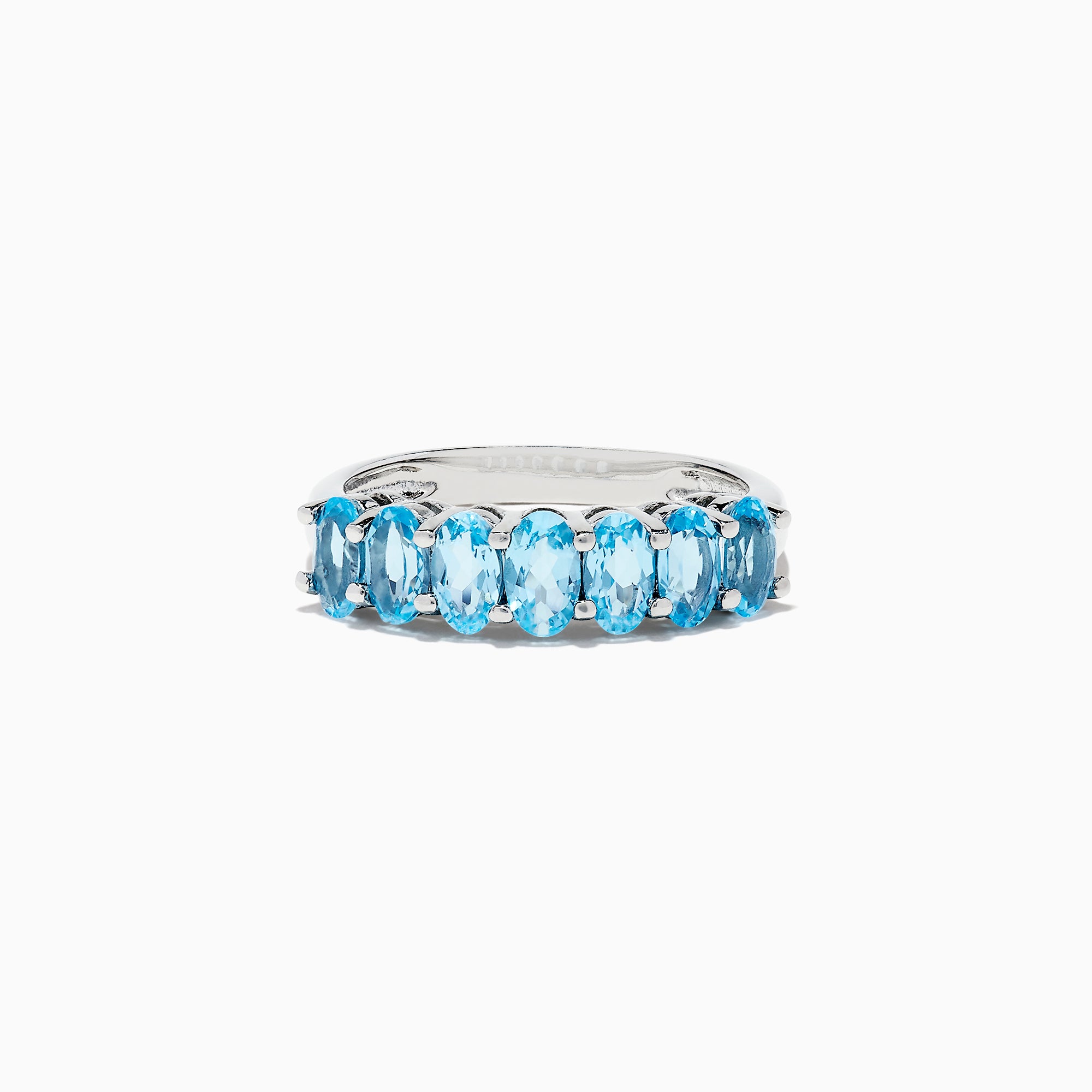 A dazzling 925 Sterling Silver Blue Topaz Ring, 1.95 TCW, showcases seven oval-cut blue topaz stones in prong settings against a white background.