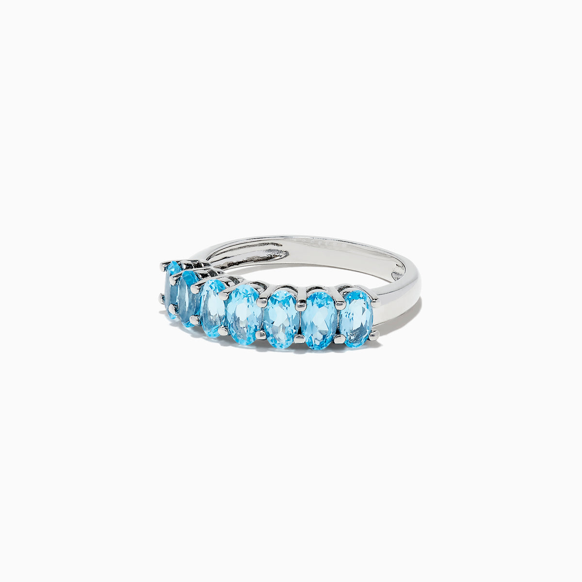 A dazzling 925 Sterling Silver Blue Topaz Ring, 1.95 TCW, showcases seven oval-cut blue topaz stones in prong settings against a white background.