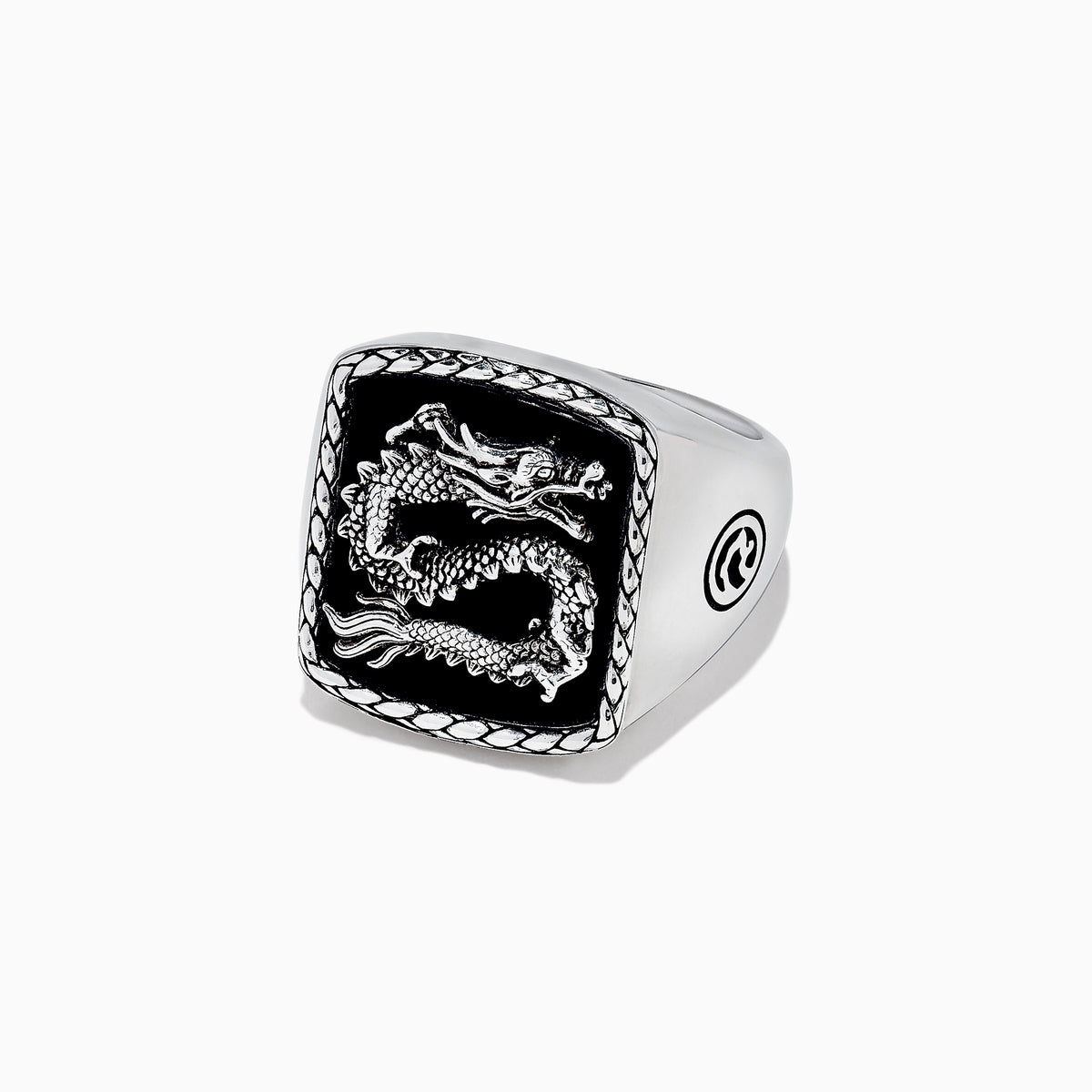 The Mens 925 Sterling Silver Onyx Dragon Ring, 5.00 TCWS, features a rectangular black onyx face with a raised dragon design, a textured border, and circular patterns on the sides.