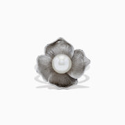 The 925 Sterling Silver Cultured Fresh Water Pearl Flower Ring features a textured floral design with a large round pearl centerpiece, shown against a white background.