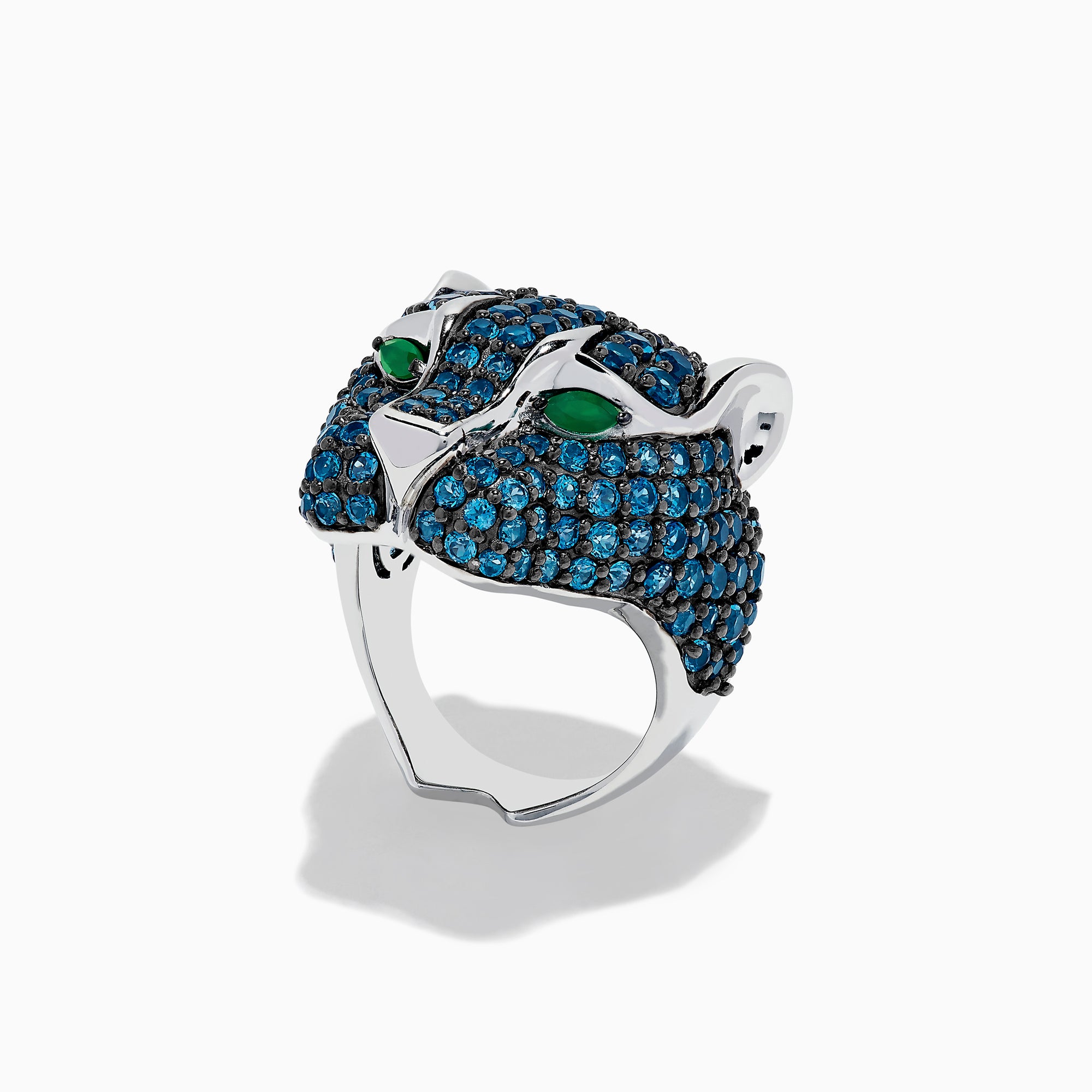 The 925 Sterling Silver Blue Topaz and Green Onyx Panther Ring features a panther’s head design with blue topaz gemstones and green onyx eyes, displayed on a white background.