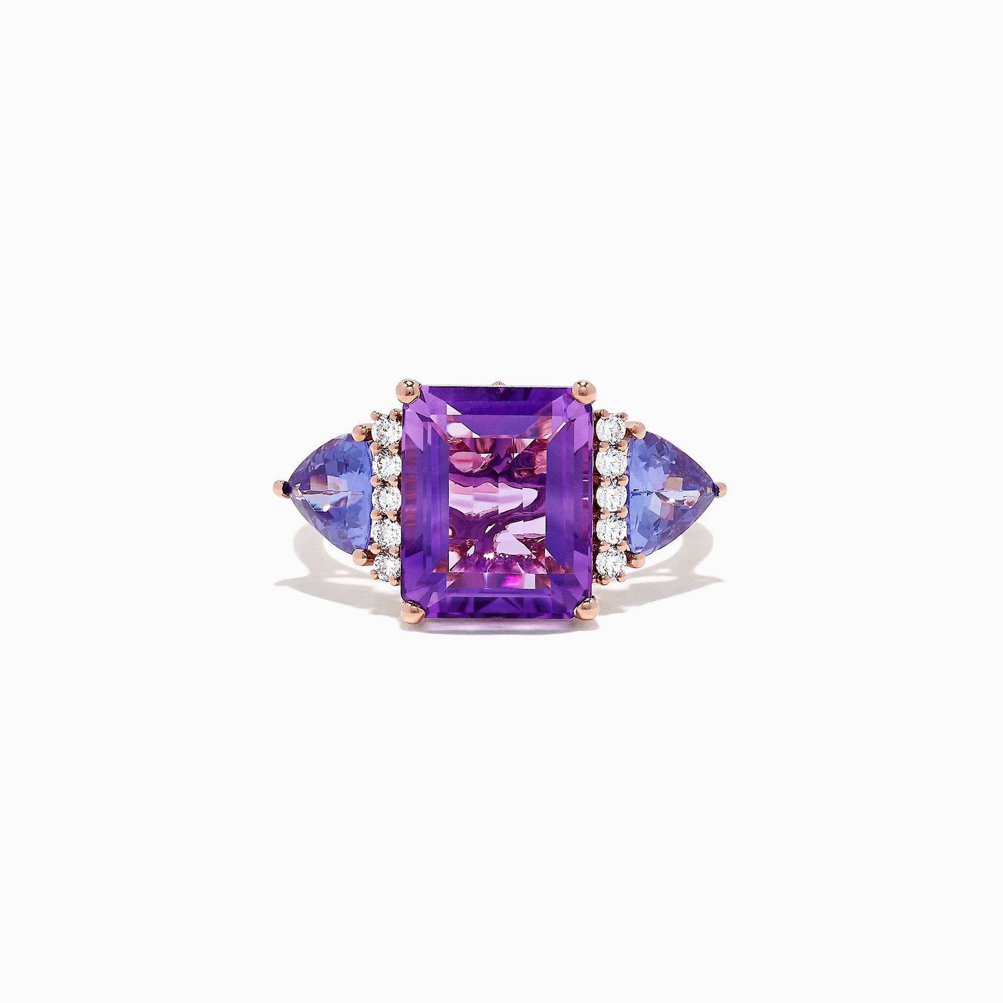 The 14K Rose Gold Amethyst, Tanzanite and Diamond Ring (7.49 TCW) showcases a large rectangular amethyst center, two triangular tanzanites, and four round diamonds on each side, all set against a white background.