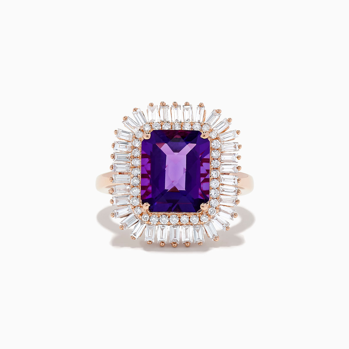 The 14K Rose Gold Amethyst and Diamond Cocktail Ring features a large rectangular amethyst center, encircled by two rows of sparkling white baguette and round diamonds in a dazzling halo setting.