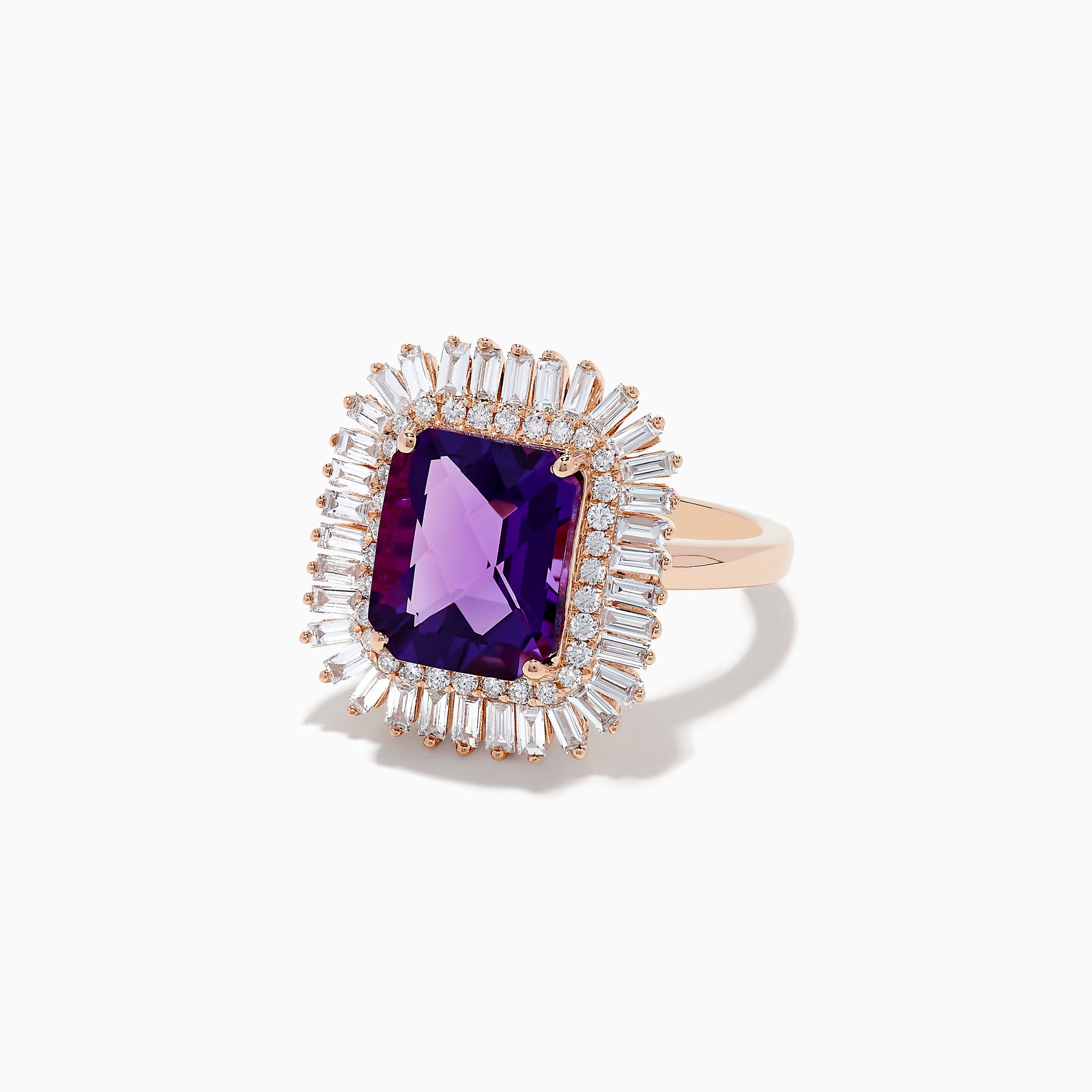 The 14K Rose Gold Amethyst and Diamond Cocktail Ring features a large rectangular amethyst center, encircled by two rows of sparkling white baguette and round diamonds in a dazzling halo setting.