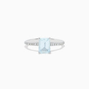 The Aquarius 14K Gold Aquamarine and Diamond Ring Set features a rectangular aquamarine centerpiece with two diamond-accented bands, shown against a plain white background.