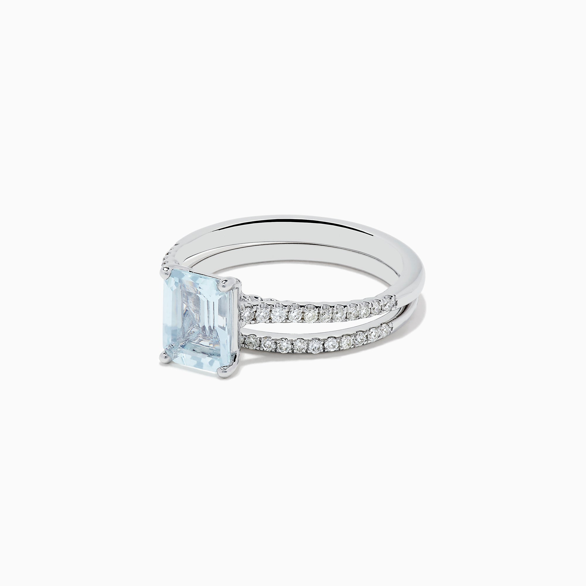 The Aquarius 14K Gold Aquamarine and Diamond Ring Set features a rectangular aquamarine centerpiece with two diamond-accented bands, shown against a plain white background.
