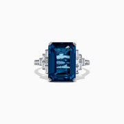 The Ocean Bleu 14K White Gold London Blue Topaz and Diamond Ring, 8.92 TCW, features a large rectangular blue topaz flanked by stepped baguette-cut diamonds, showcased on a white background.