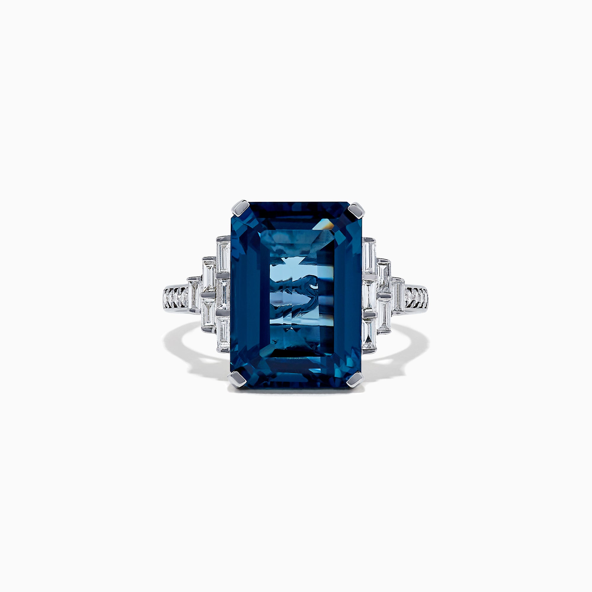The Ocean Bleu 14K White Gold London Blue Topaz and Diamond Ring, 8.92 TCW, features a large rectangular blue topaz flanked by stepped baguette-cut diamonds, showcased on a white background.