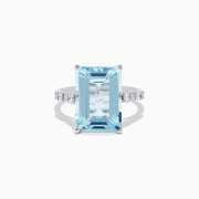 The Aquarius 14K White Gold Aquamarine and Diamond Cocktail Ring features a large rectangular aquamarine center stone flanked by round diamonds, all set in white gold and shown against a white background.
