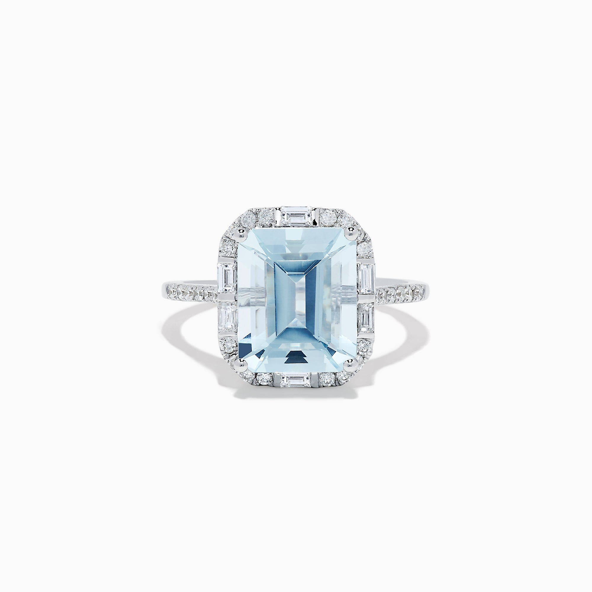 The Aquarius 14K White Gold Aquamarine and Diamond Ring showcases a large emerald-cut aquamarine center stone encircled by sparkling diamonds, presented against a white background.