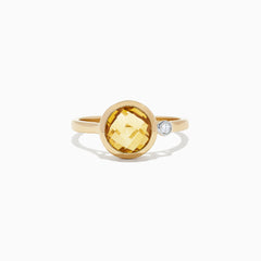 The Sunset 14K Yellow Gold Citrine and Diamond Ring, 1.53 TCW, features a round faceted citrine centerpiece accented by a small round diamond, shown against a plain white background.