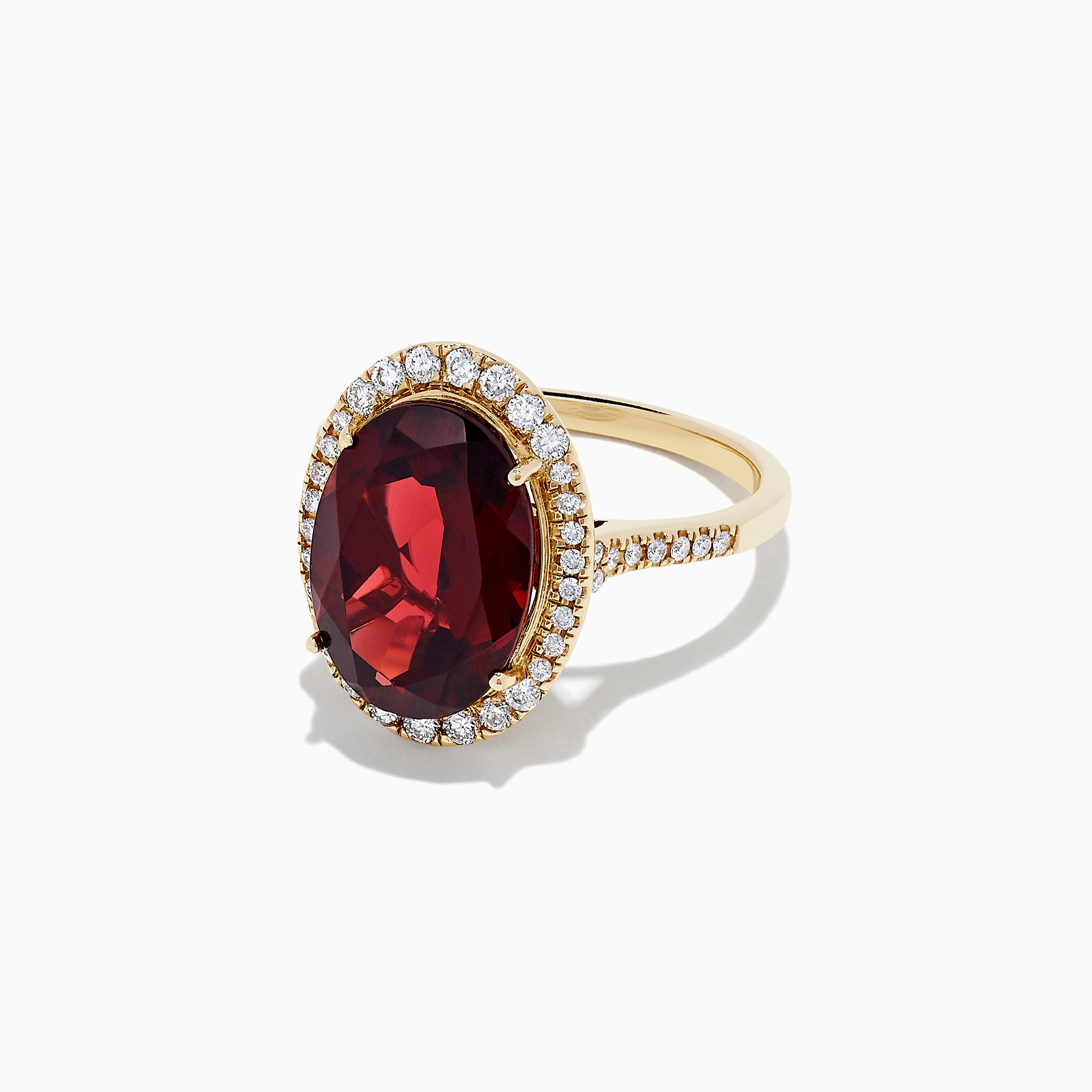 The Bordeaux 14K Yellow Gold Garnet and Diamond Cocktail Ring, 7.78 TCW, features a large oval deep red garnet encircled by a halo of sparkling diamonds, shown against a plain white background.