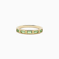 The 14K Yellow Gold Peridot Ring features a row of rectangular green peridot gemstones set around the band.