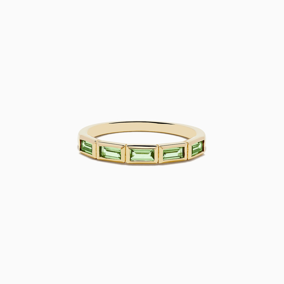 The 14K Yellow Gold Peridot Ring features a row of rectangular green peridot gemstones set around the band.