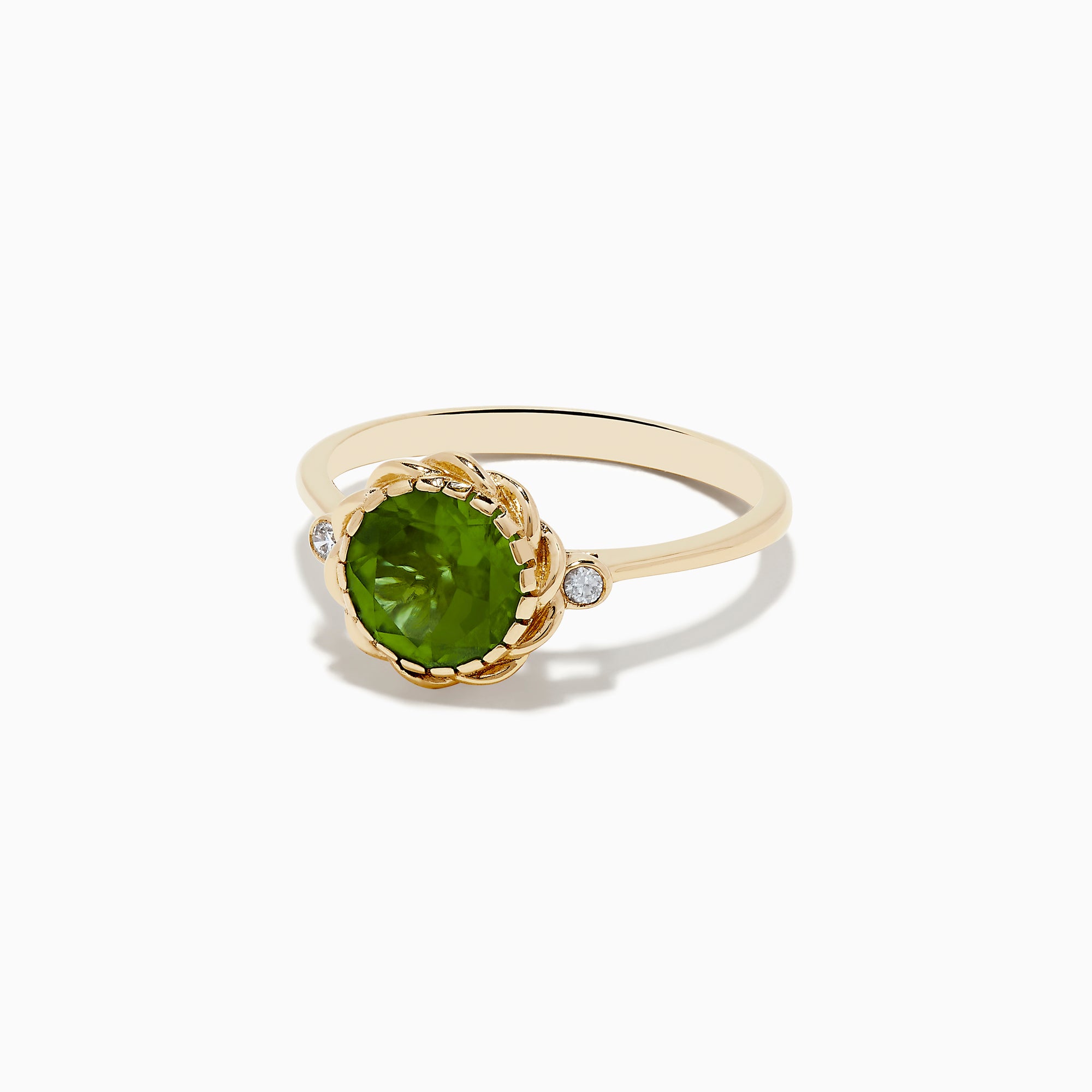 The 14K Yellow Gold Peridot and Diamond Ring showcases a round Peridot center stone with two small diamonds on each side, displayed against a white background.