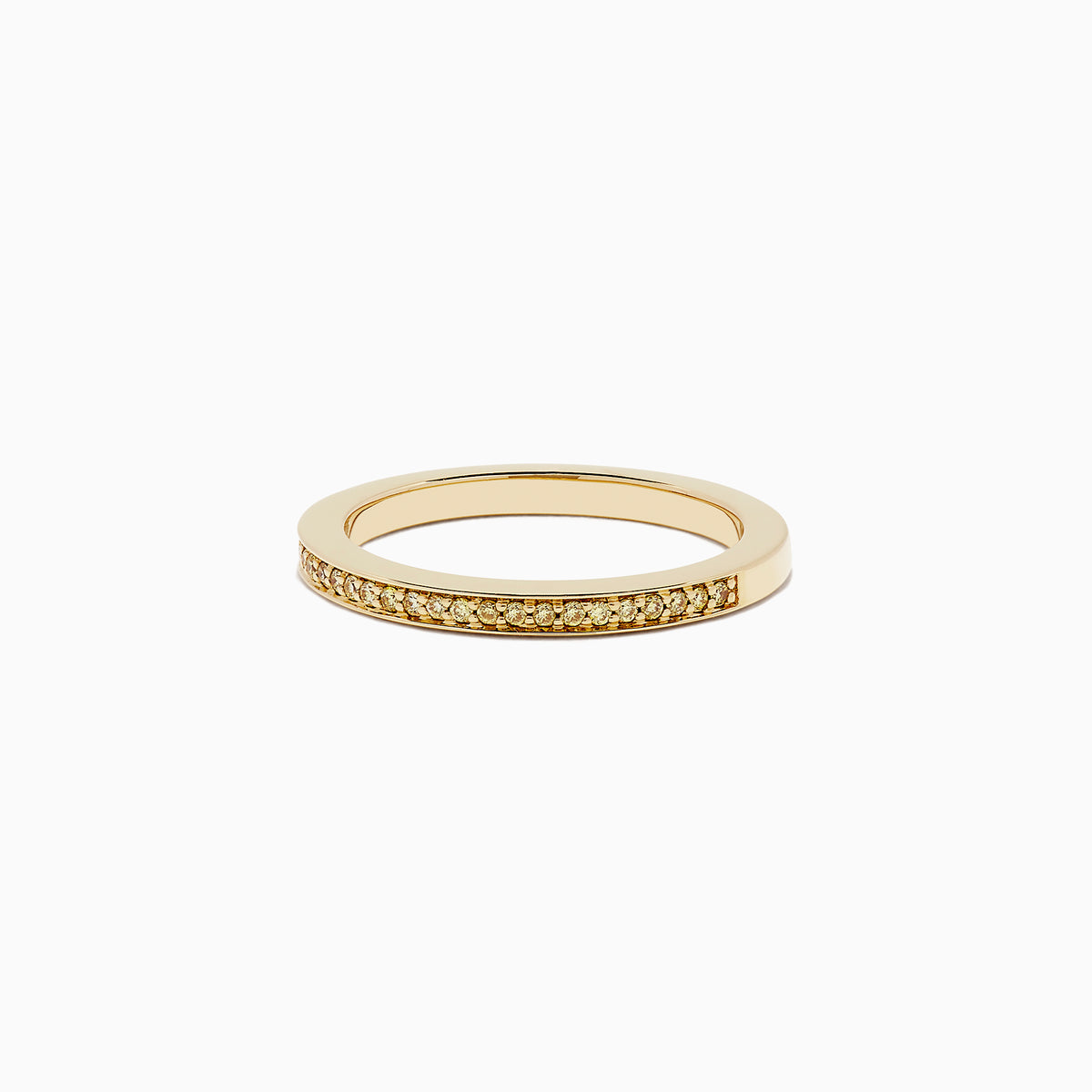 An 18K yellow gold half eternity band ring, featuring 0.13 TCW of sparkling yellow diamonds, is displayed against a plain white background.