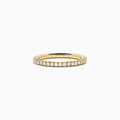 An 18K Yellow Gold Yellow Diamond Eternity Band, 0.54 TCW, featuring a continuous circle of small yellow diamonds, is shown on a plain white background.