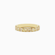 An 18K yellow gold band ring featuring a continuous row of cushion cut yellow diamonds (1.83 TCW), photographed on a plain white background.