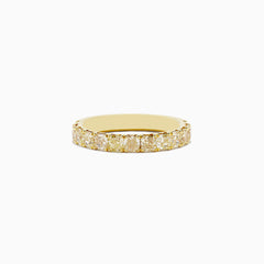 An 18K yellow gold band ring featuring a continuous row of cushion cut yellow diamonds (1.83 TCW), photographed on a plain white background.