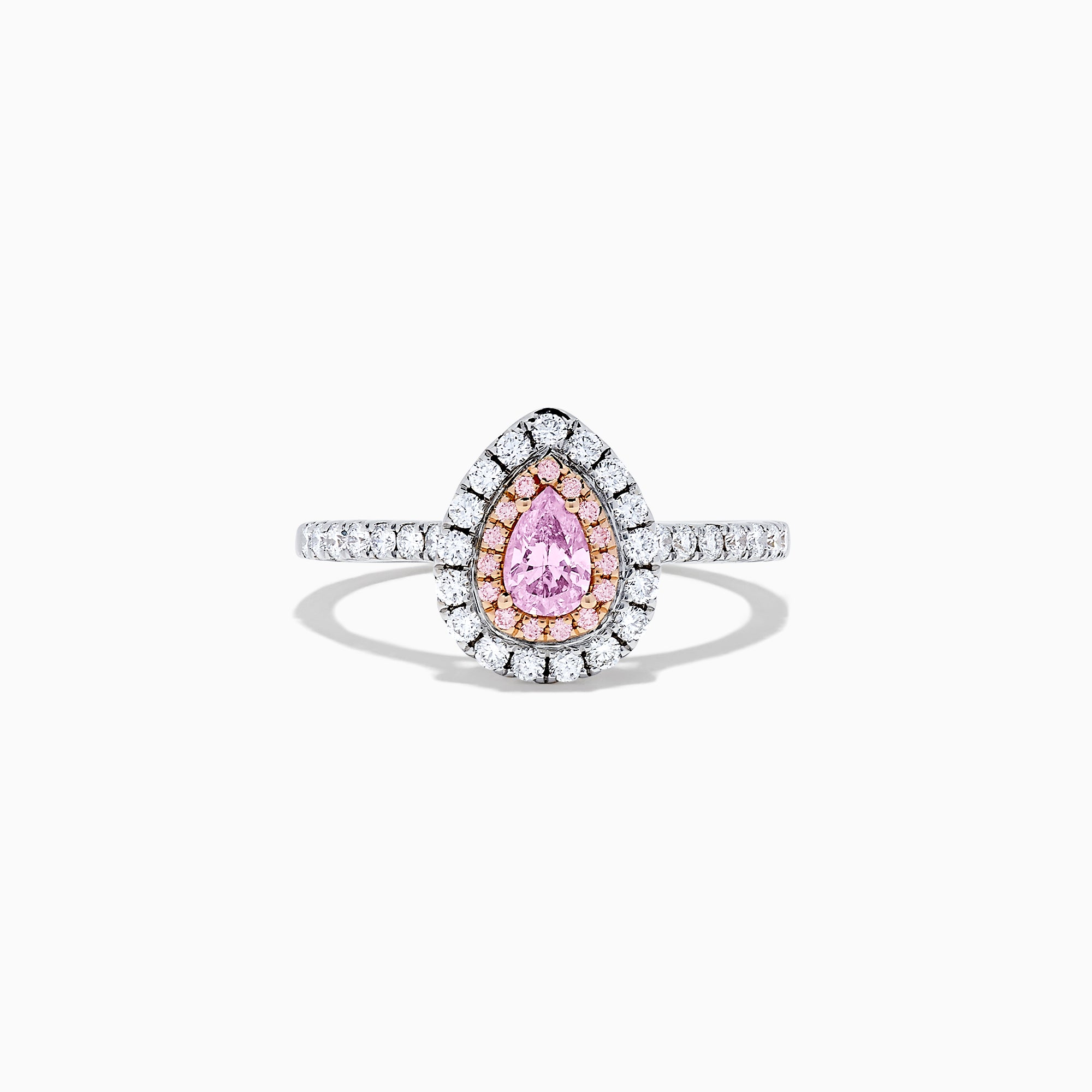 A teardrop-shaped 18K two tone gold ring features a GIA certified pink diamond (0.71 TCW) with a double halo of white and pink diamonds, set on a white diamond band, displayed against a white background.