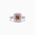 The 18K Gold White, Pink and GIA Certified Pinkish-Brown Diamond Ring features a stunning 1.44 TCW square pinkish-brown diamond with pink and white diamond halos, showcasing quality and brilliance.