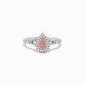The 18K Two Tone Gold Pink and White Diamond Ring, 0.35 TCW, showcases a teardrop-shaped cluster of pink and white diamonds, bordered by clear stones and accented with diamonds along the band.
