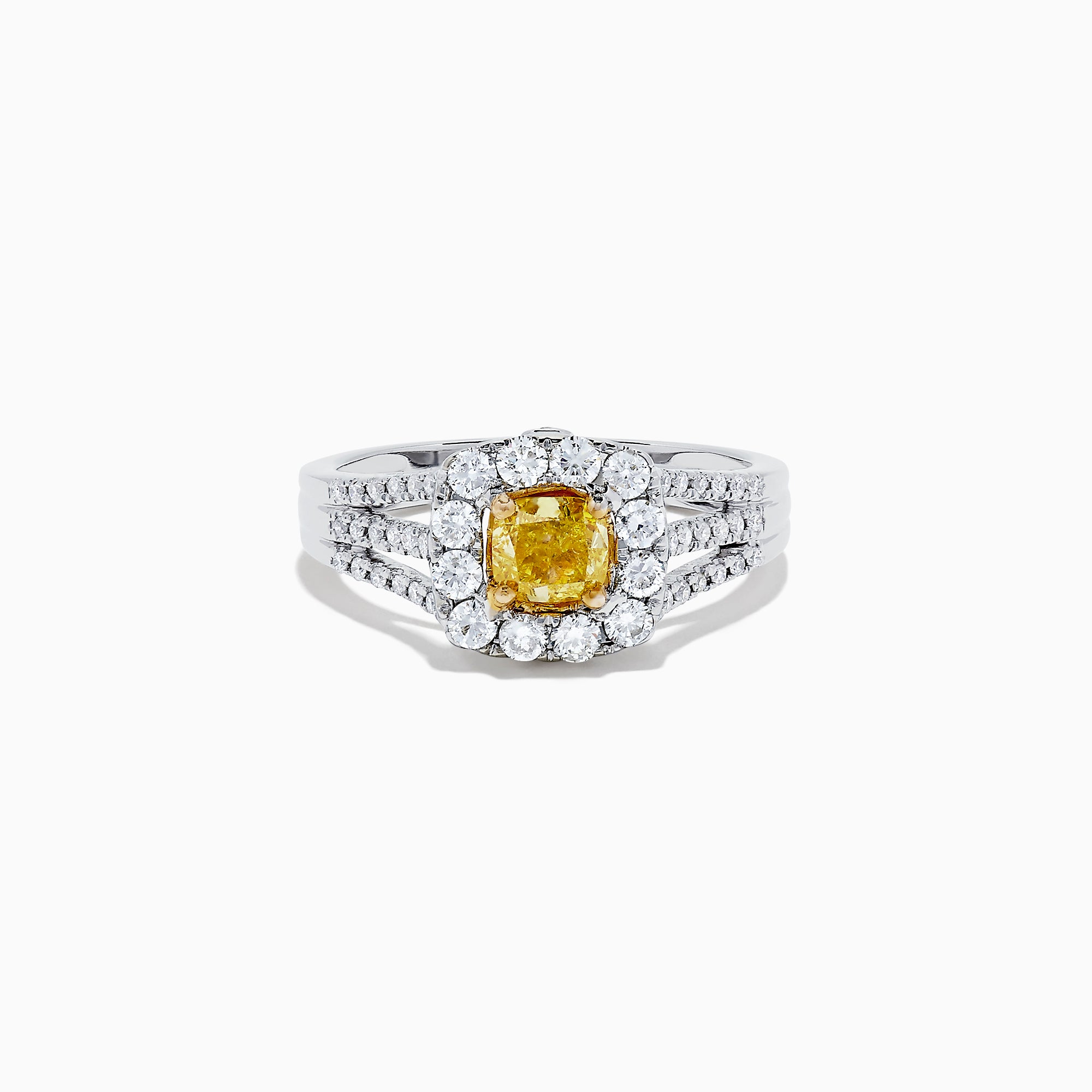 The 14K Two Tone Gold Yellow and White Diamond Ring features a cushion-cut yellow center stone, white diamond halo, split shank band, and a total weight of 1.22 TCW.
