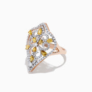 The 14K Rose Gold Yellow and White Diamond Filagree Ring, 1.55 TCW, showcases a large pointed design with yellow teardrop gemstones and white diamonds set in ornate patterns on a filigree band.