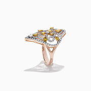 The 14K Rose Gold Yellow and White Diamond Filagree Ring, 1.55 TCW, showcases a large pointed design with yellow teardrop gemstones and white diamonds set in ornate patterns on a filigree band.