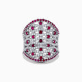 The 14K White Gold Ruby and Diamond Ring, 2.11 TCW, features rows of sparkling diamonds in a lattice pattern, accented with small round rubies along the edges and at the center of each diamond cluster.
