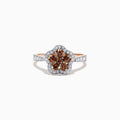 The 14K Rose Gold Espresso and White Diamond Flower Ring features a flower-shaped cluster of brown stones, a white diamond halo, and additional accents along the band. Total carat weight: 0.55 TCW.