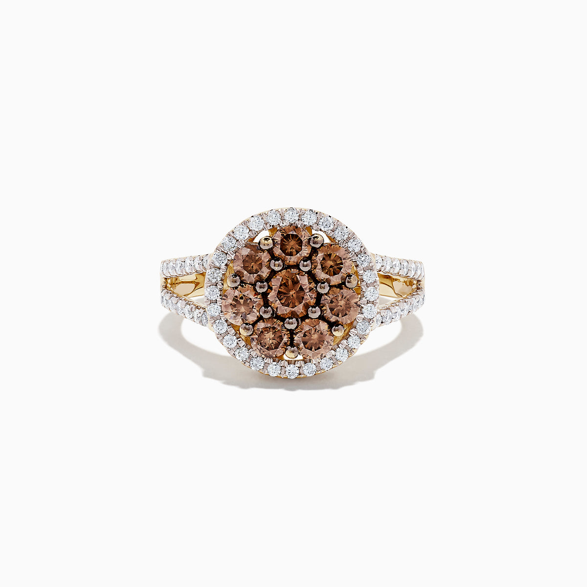The 14K Yellow Gold Espresso and White Diamond Ring features a round cluster of brown diamonds, haloed by white diamonds with more along the split shank. Totaling 1.45 TCW, this elegant ring highlights each white diamond’s brilliance.