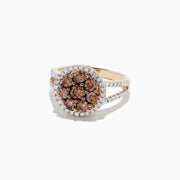 The 14K Yellow Gold Espresso and White Diamond Ring features a round cluster of brown diamonds, haloed by white diamonds with more along the split shank. Totaling 1.45 TCW, this elegant ring highlights each white diamond’s brilliance.