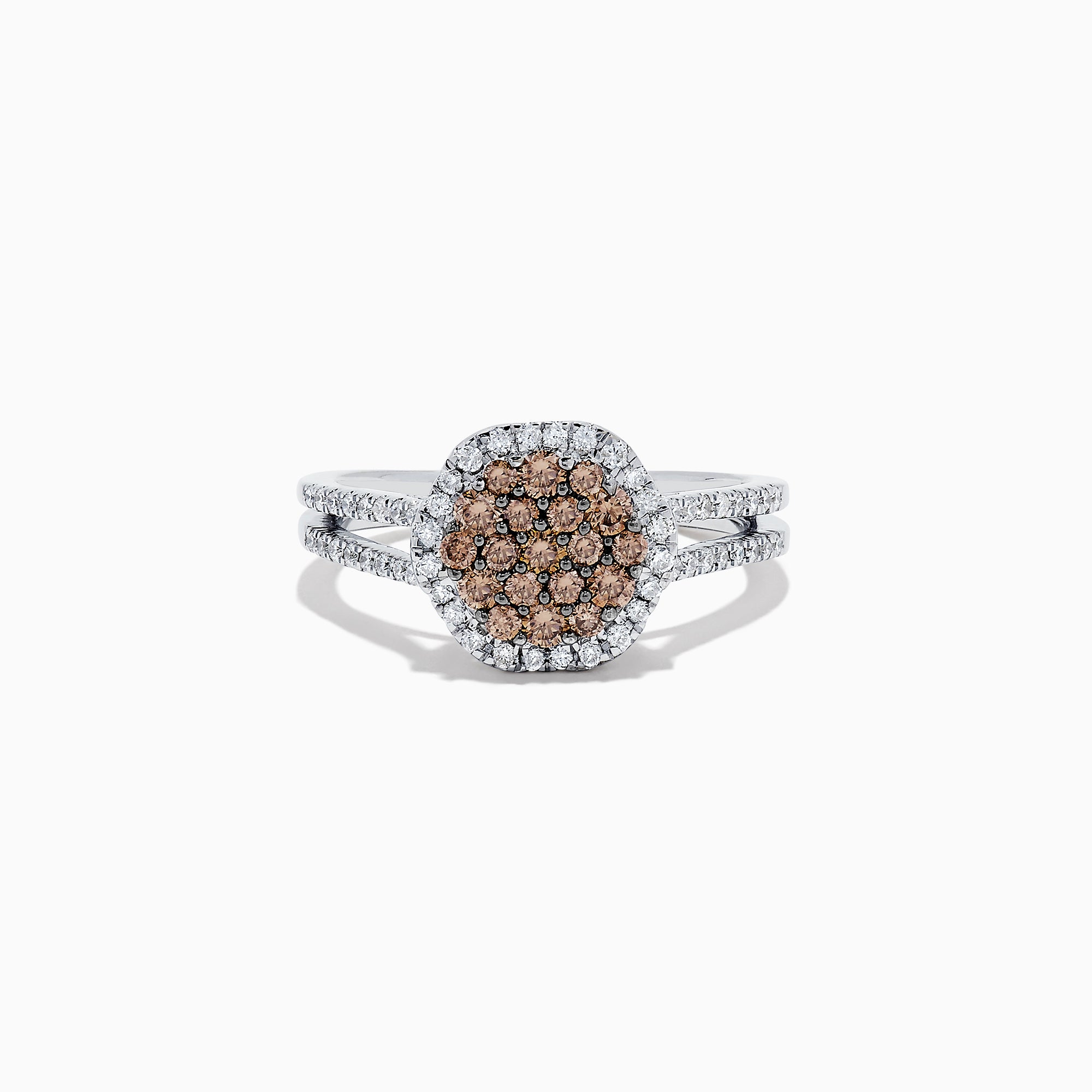 This 14K White Gold Espresso and White Diamond Ring features a split shank and a 1.50 TCW cluster of round brown diamonds at the center, surrounded by a halo of sparkling white diamonds.